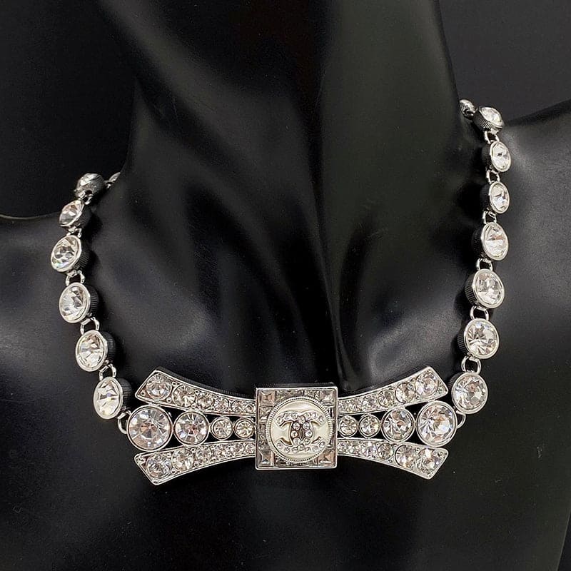 18K  Chanel Diamond Bow Tie Pendant Necklace