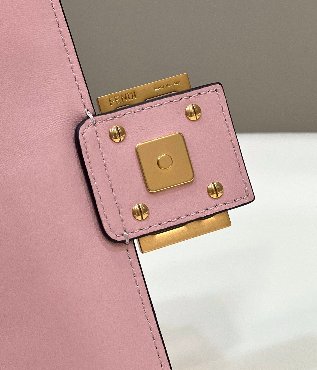 BAGUETTE WITH FF MOTIF 27 IN LIGHT PINK SOFT LAMBSKIN GOLD HARDWARE