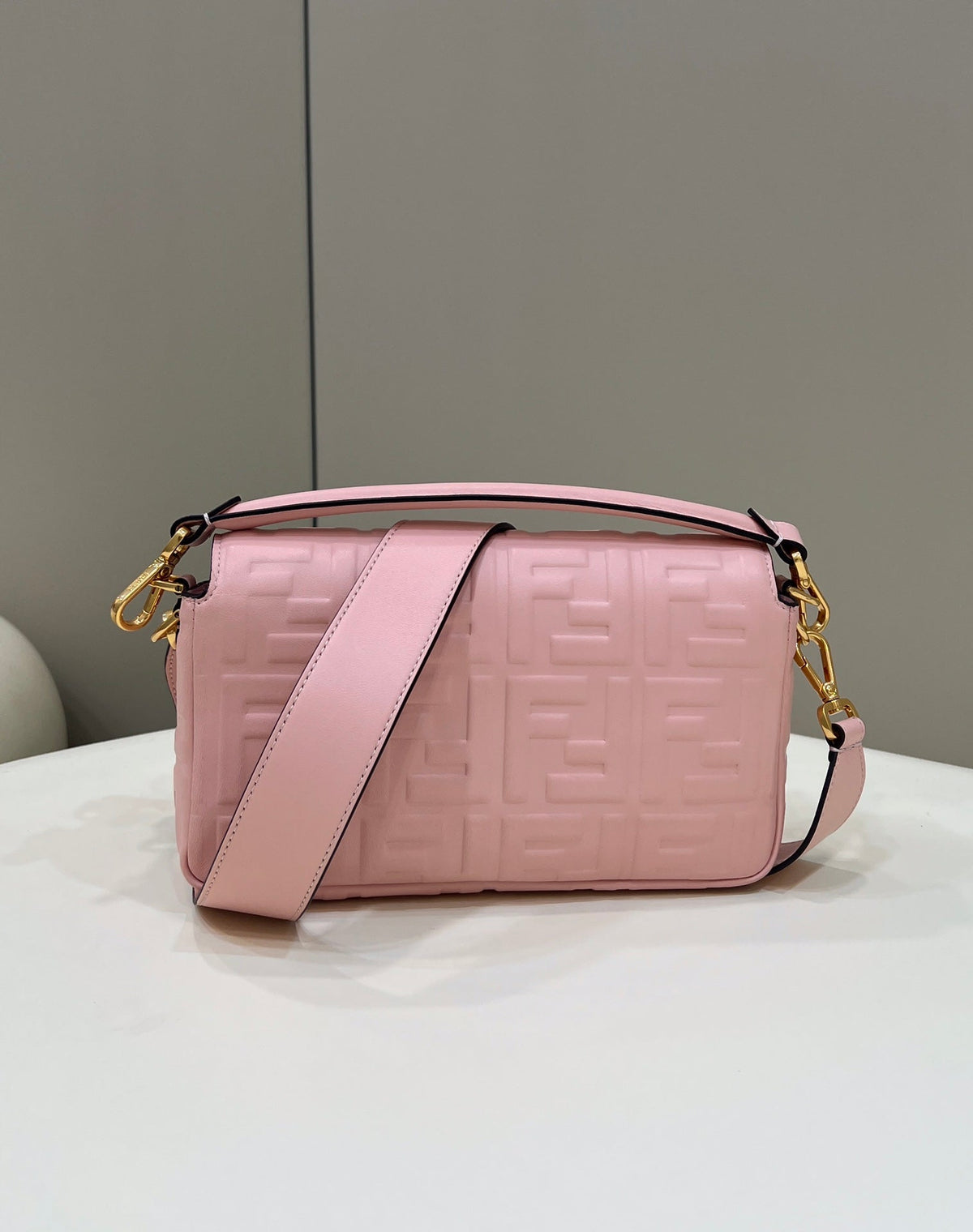 BAGUETTE WITH FF MOTIF 27 IN LIGHT PINK SOFT LAMBSKIN GOLD HARDWARE