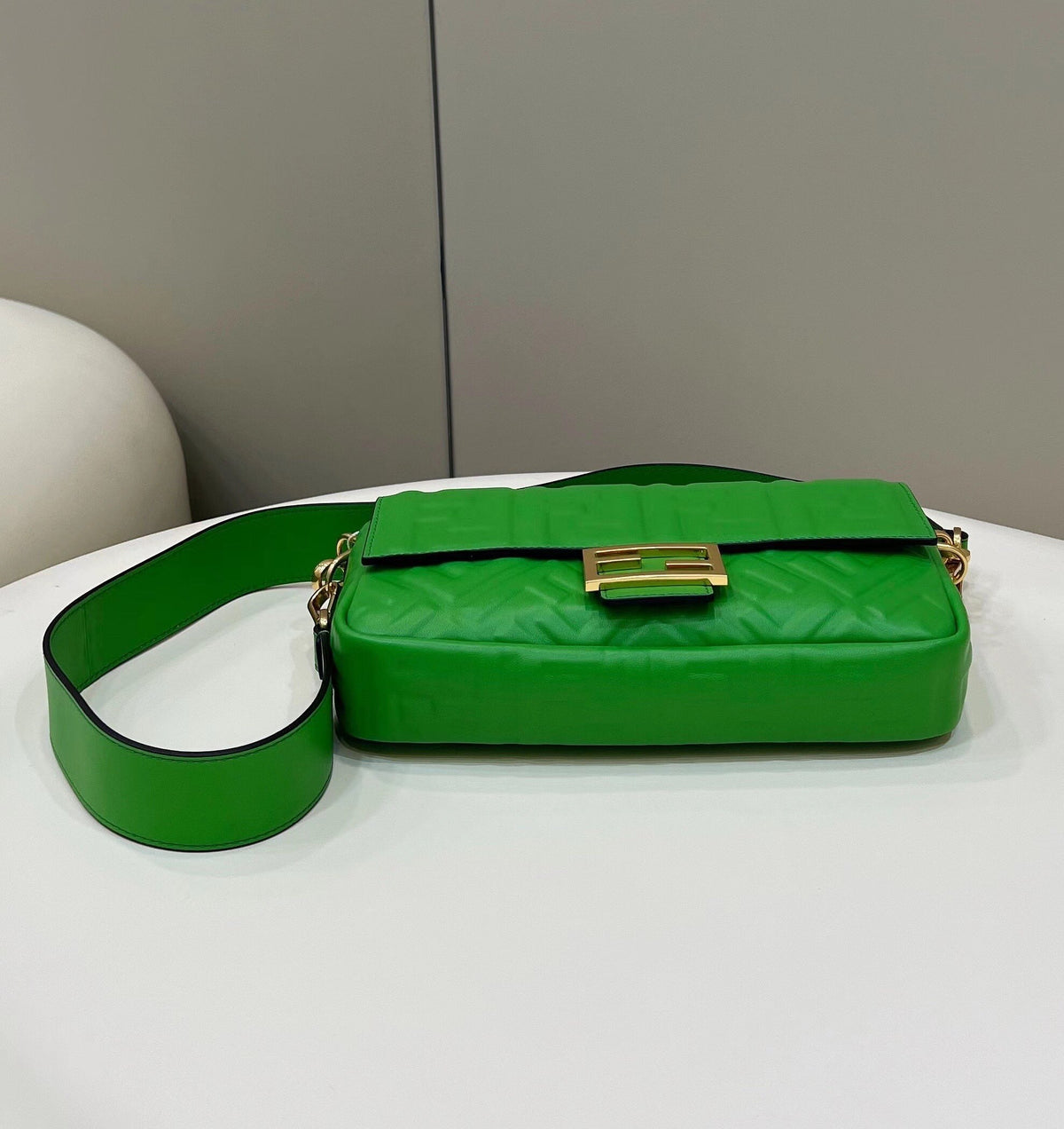 BAGUETTE WITH FF MOTIF 27 IN EMERALD GREEN SOFT LAMBSKIN GOLD HARDWARE