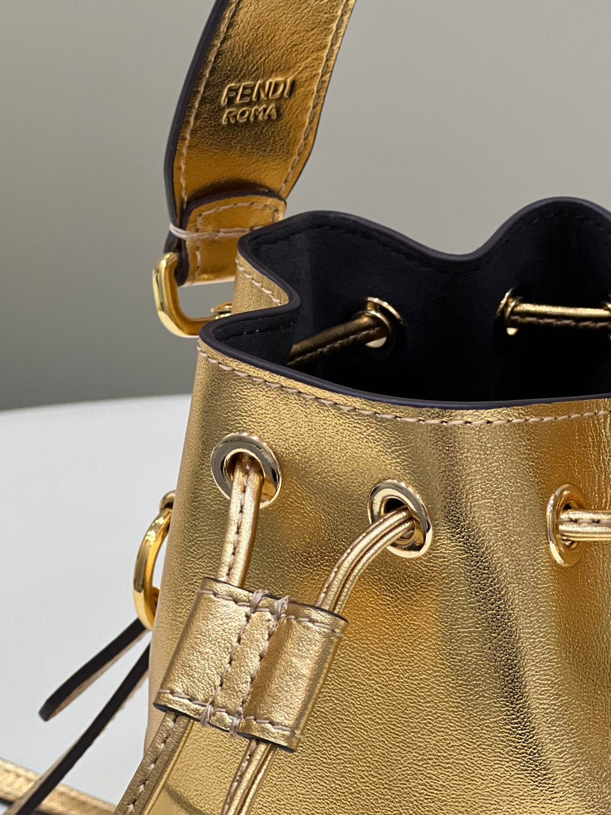 MON TRESOR 18 IN GOLD METALLIC CALFSKIN