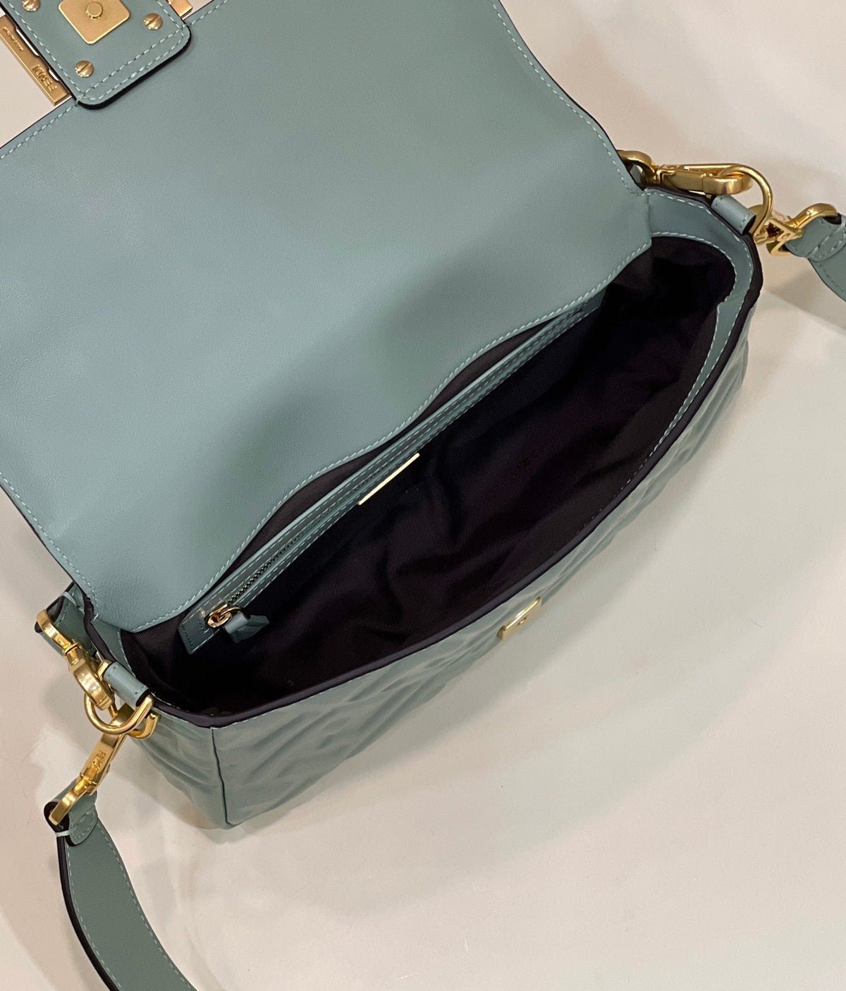 BAGUETTE WITH FF MOTIF 27 IN VIRIDIAN GREEN SOFT LAMBSKIN GOLD HARDWARE