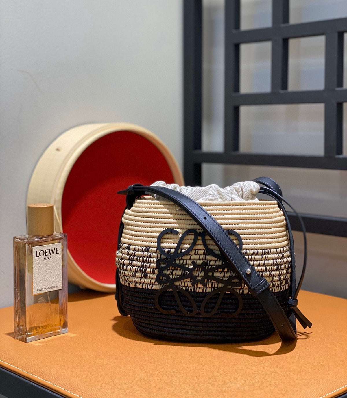 LOE 18 ANAGRAM BASKET BAG IN BLACK AND NATURAL RAFFIA