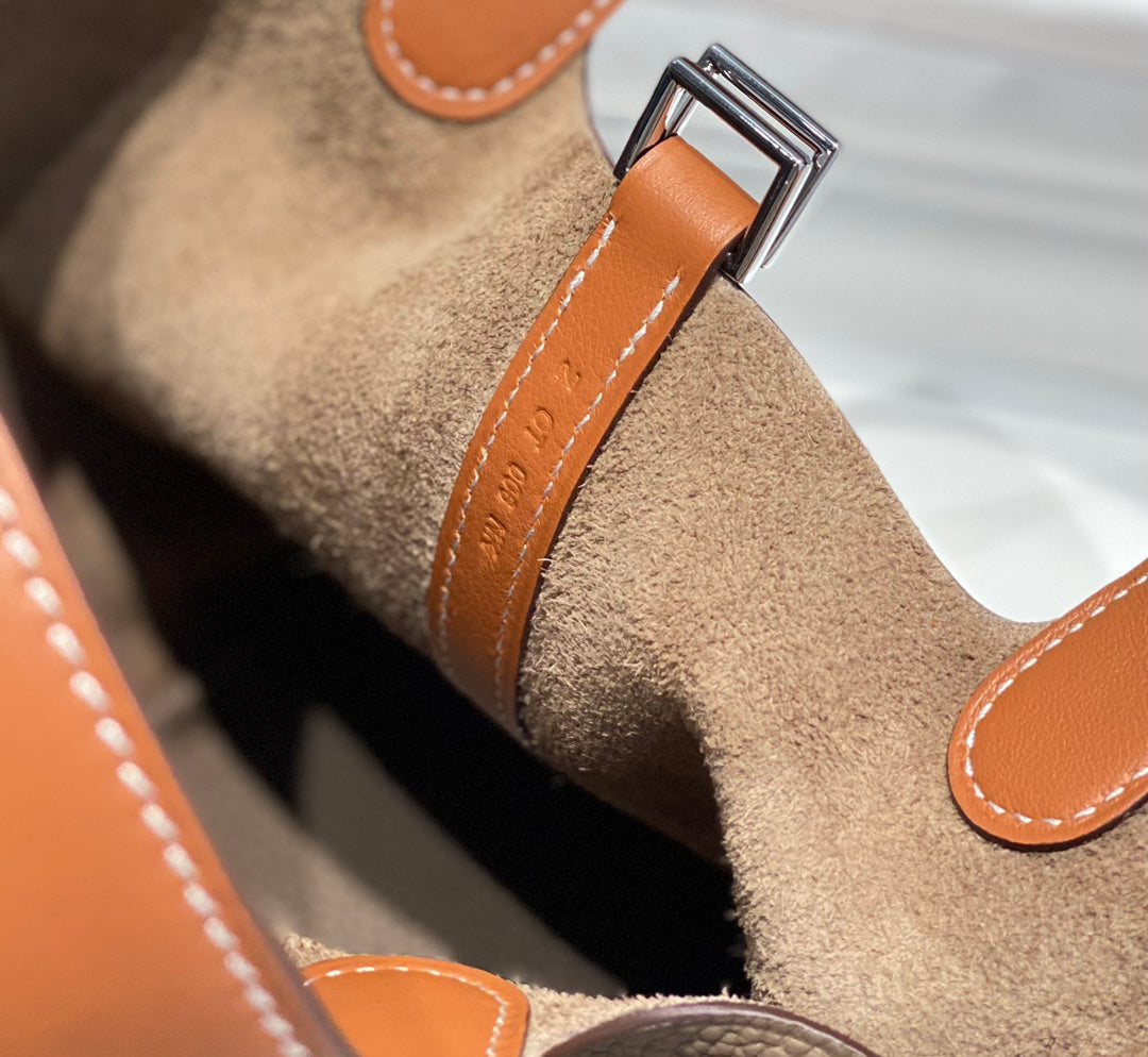 HERMES 25S PICOTIN LOCK 18 IN BURNT ORANGE AND BROWN CALFSKIN SILVER HARDWARE