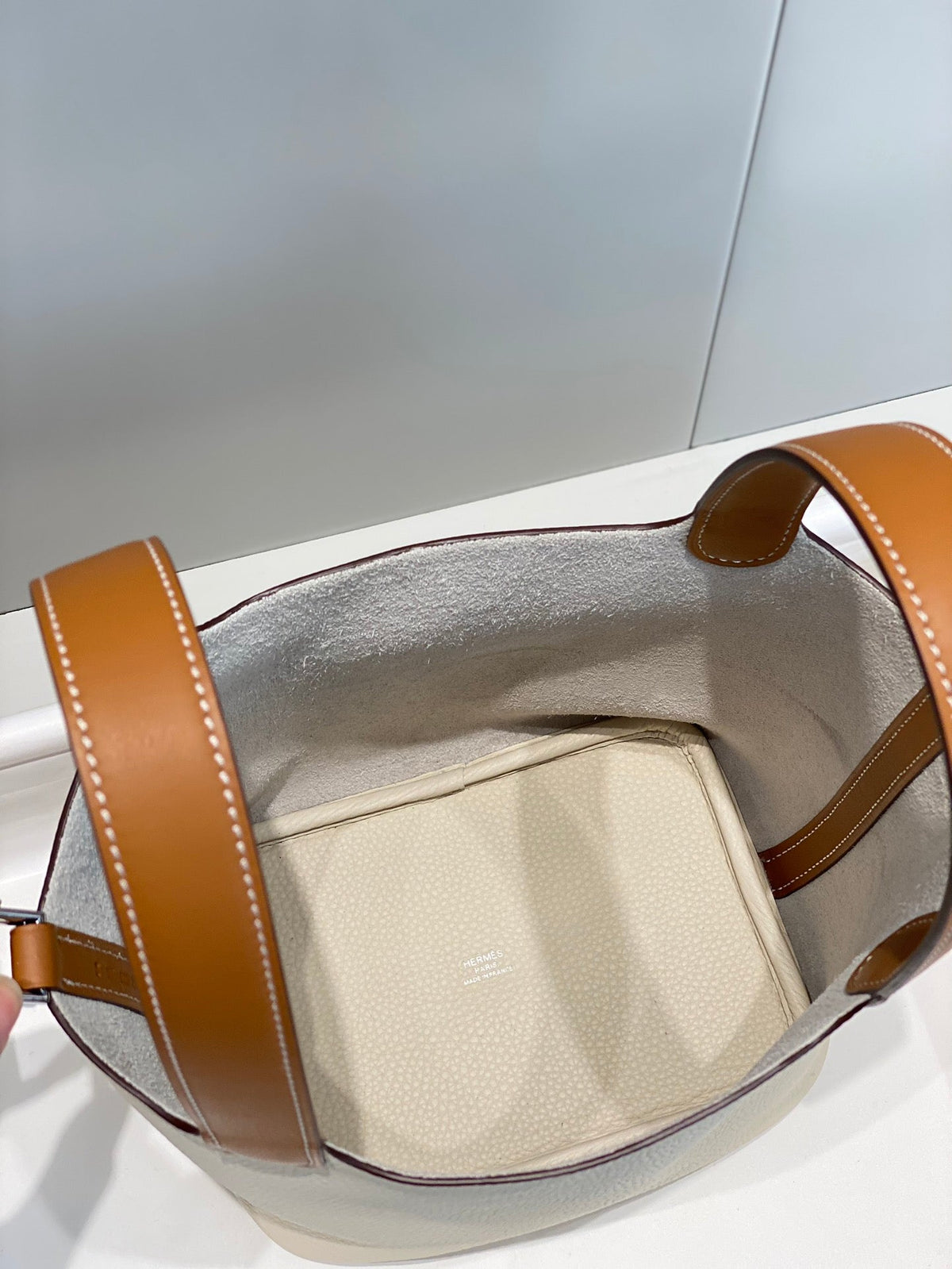 HERMES 25S PICOTIN LOCK 18 IN BURNT ORANGE AND IVORY CALFSKIN SILVER HARDWARE