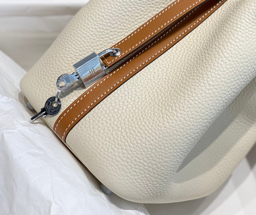 HERMES 25S PICOTIN LOCK 18 IN BURNT ORANGE AND IVORY CALFSKIN SILVER HARDWARE