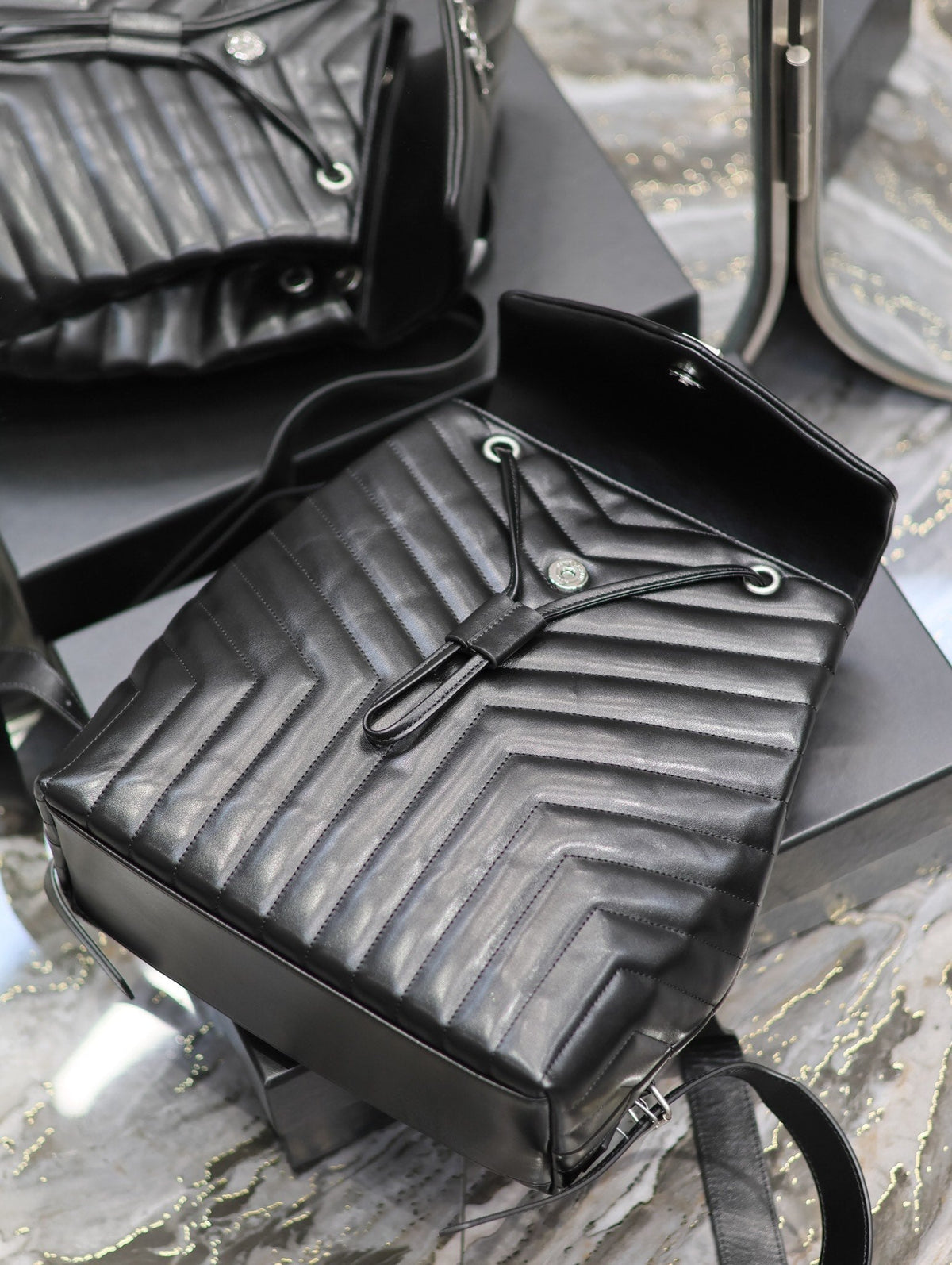 LOU BACKPACK 33 IN BLACK QUILTED CALFSKIN SILVER HARDWARE