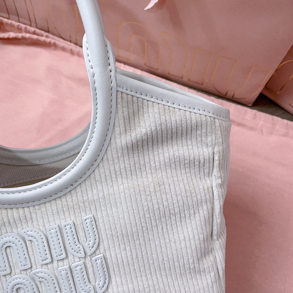 IVY HANDBAG 22 IN WHITE CANVAS