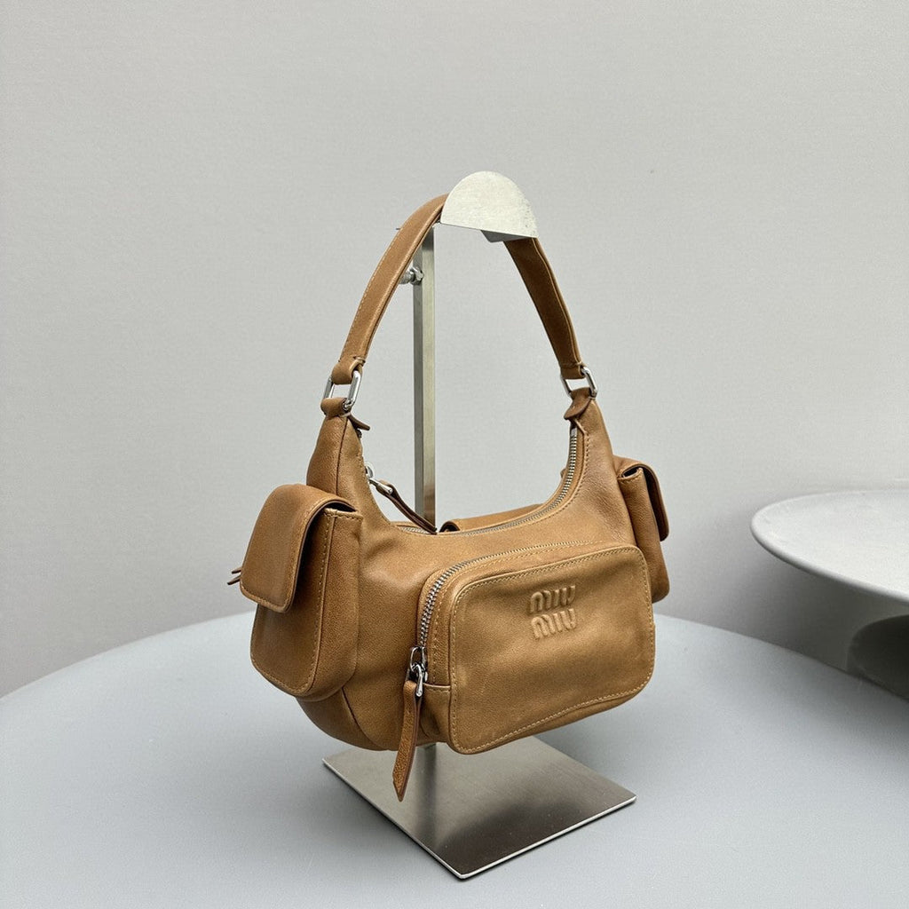 PUCKET BAG 21 IN PEANUT BROWN CALFSKIN
