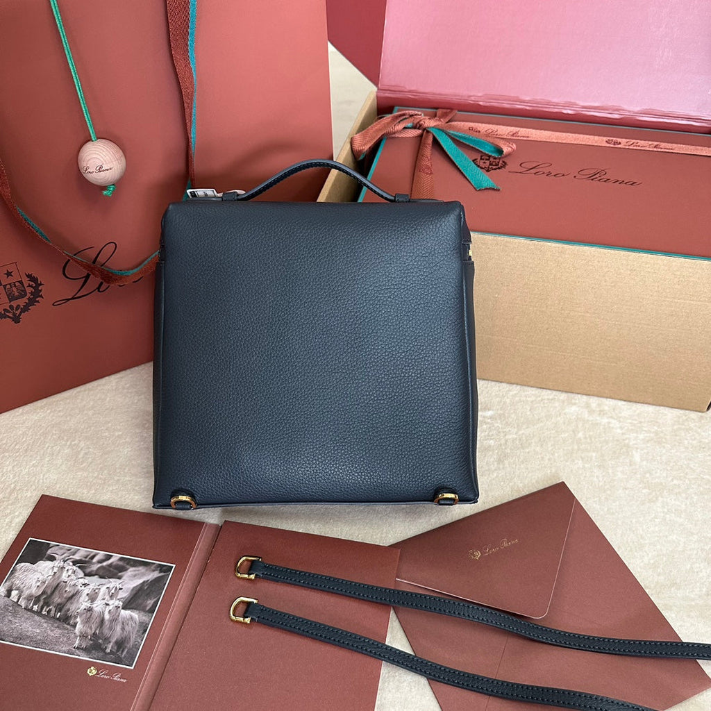 EXTRA POCKET BACKPACK L23.5 IN DARK BLUE CALFSKIN WITH GOLD HARDWARE
