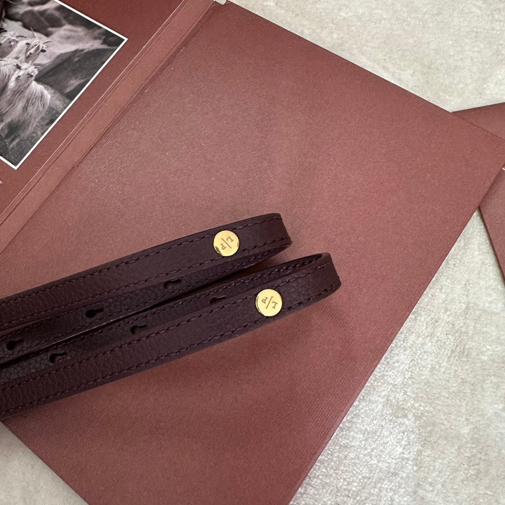 EXTRA POCKET BACKPACK L23.5 IN WINE PURPLE CALFSKIN WITH GOLD HARDWARE