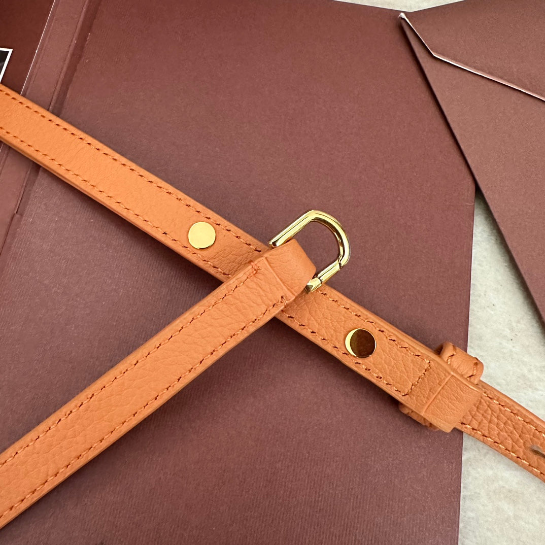EXTRA POCKET L19 IN MANGO ORANGE GRAINED CALFSKIN WITH GOLD HARDWARE