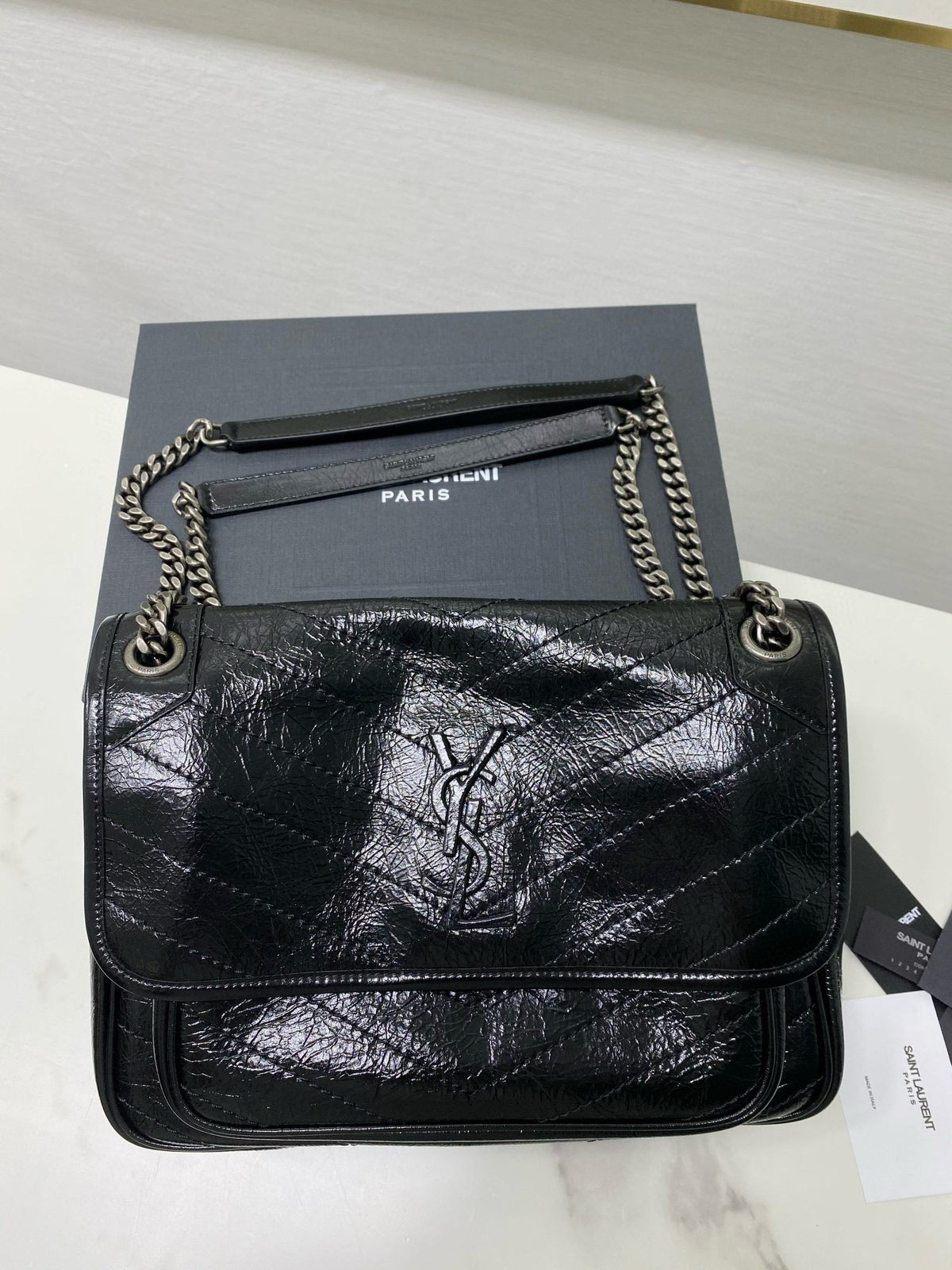 MEDIUM NIKI 28 IN BLACK CALFSKIN CHAIN BAG High-end