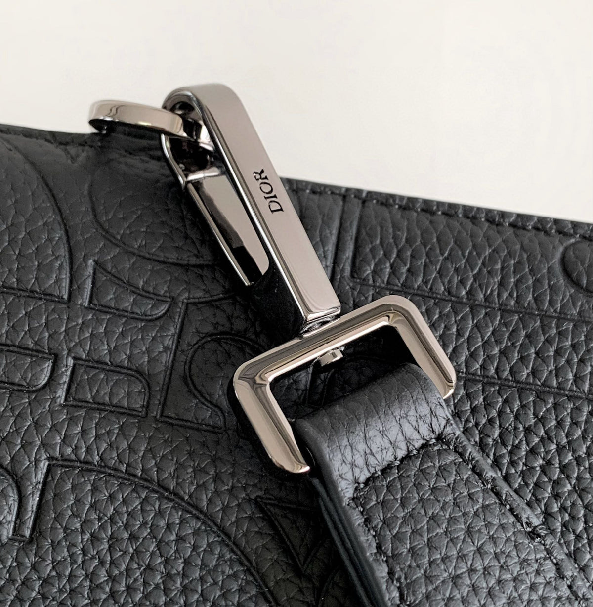 CLUTCH 27 BAG IN BLACK CALFSKIN EMBOSSED LOGO