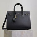 YSL 25S SAC DE JOUR GM 32 IN BLACK SUPPLE GRAINED CALFSKIN GOLD HARDWARE