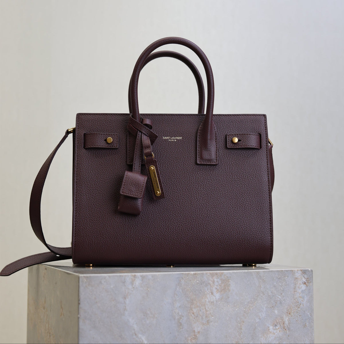 YSL 25S SAC DE JOUR MM 26 IN ROUGE CABERNET SUPPLE GRAINED CALFSKIN