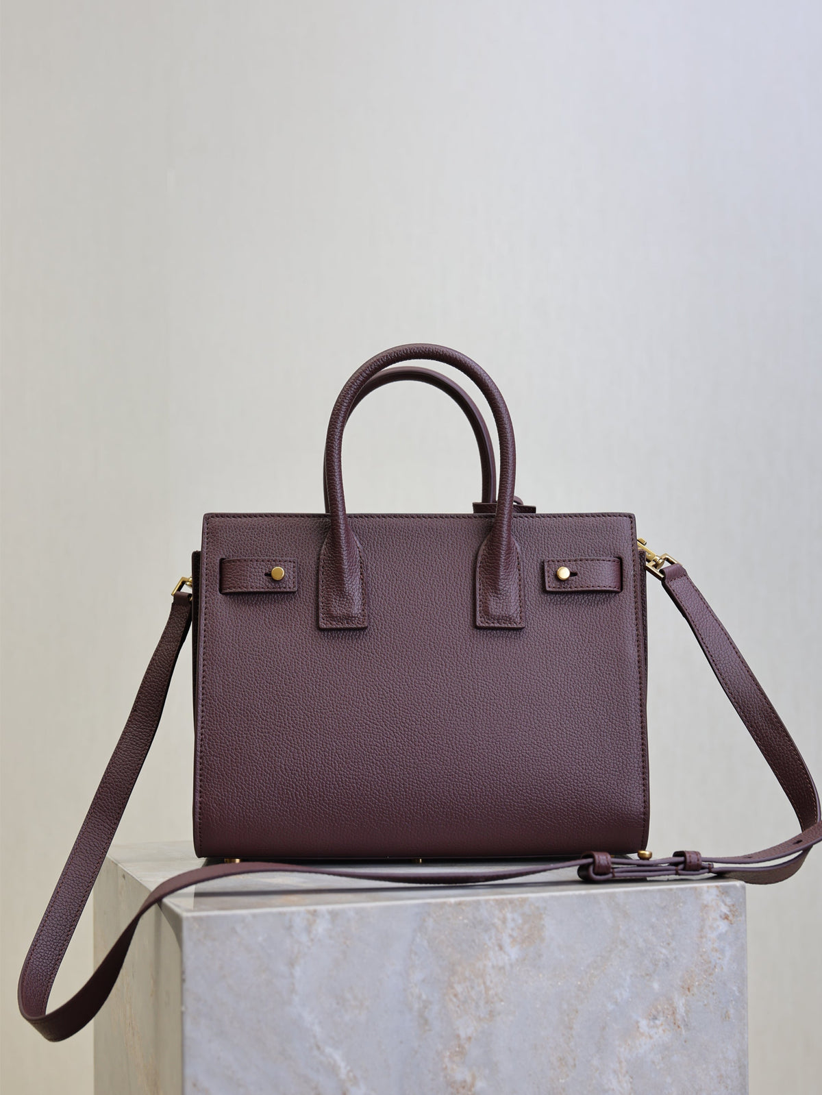 YSL 25S SAC DE JOUR MM 26 IN ROUGE CABERNET SUPPLE GRAINED CALFSKIN
