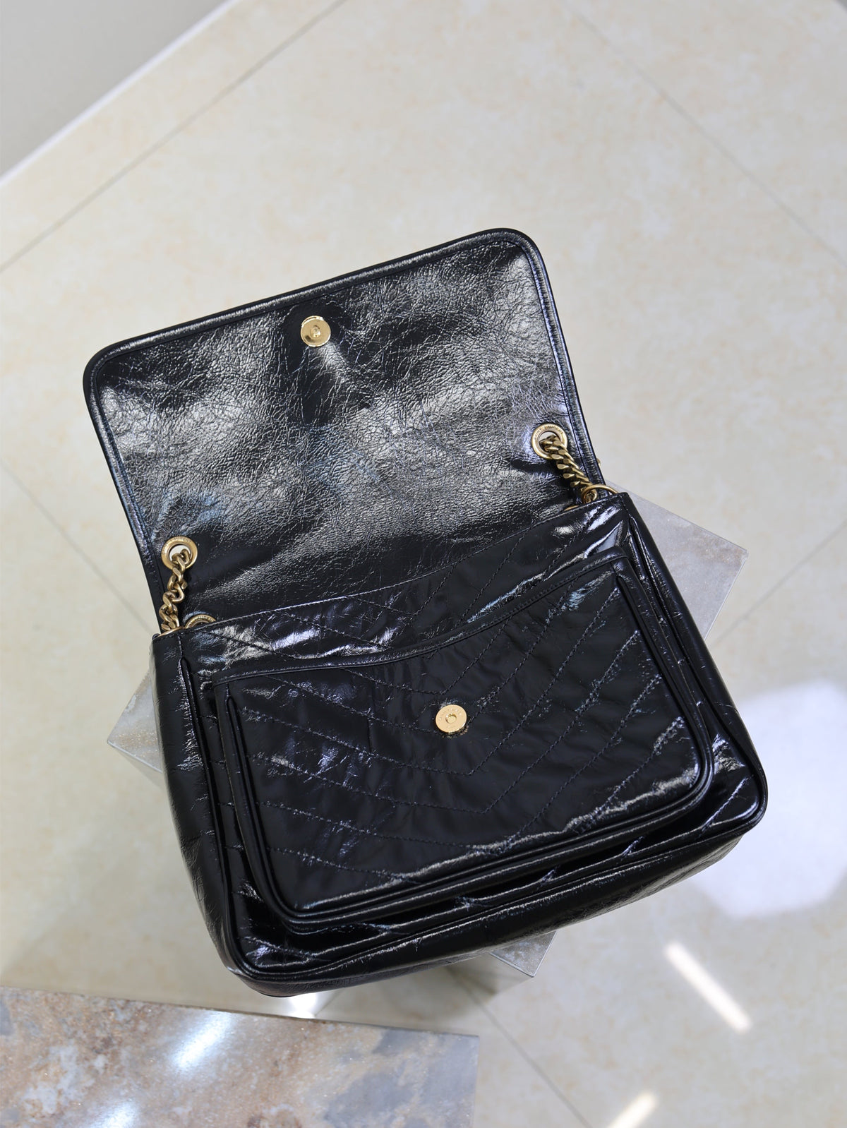 YSL 25S NIKI GM BAG 32 IN BLACK GLOSSY CALFSKIN GOLD HARDWARE
