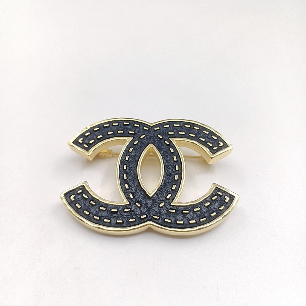 18K  Chanel Black Brooch