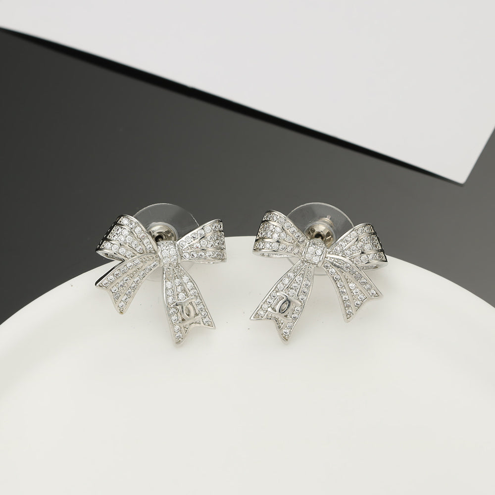 18K  Chanel Bow Tie Diamond Earrings