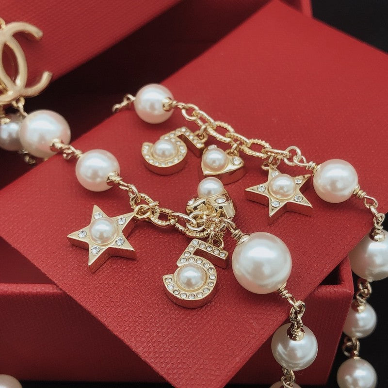 18K  Chanel No.5 Star Long Pearl Necklace