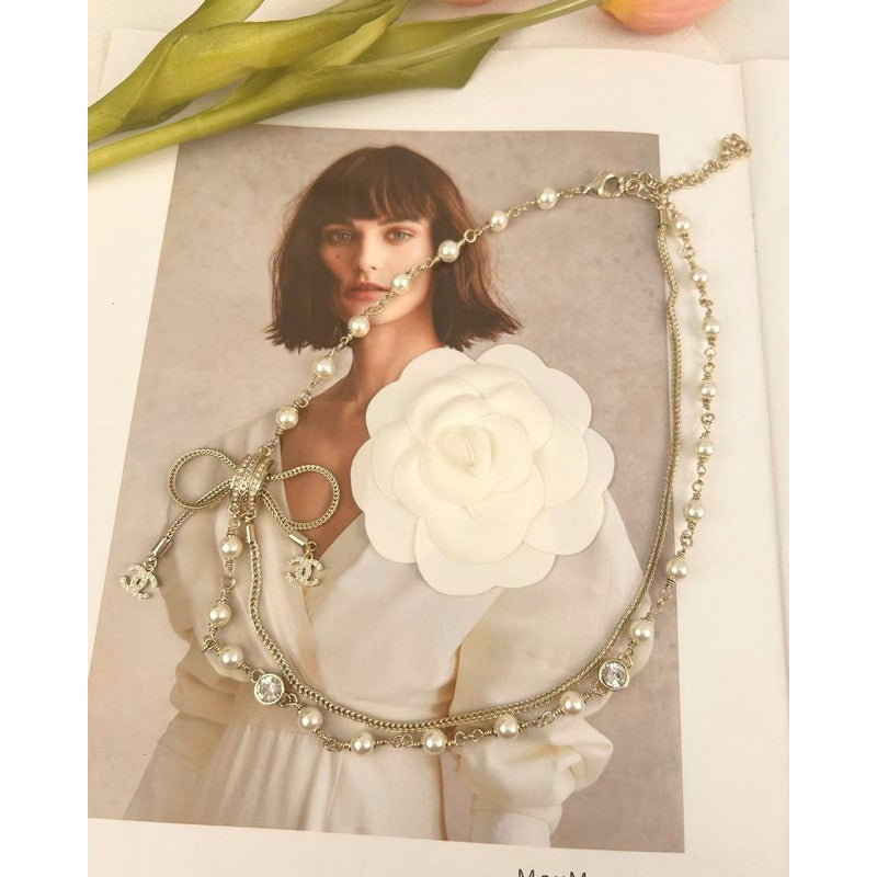 18K  Chanel Bow Tie Pearl Necklace