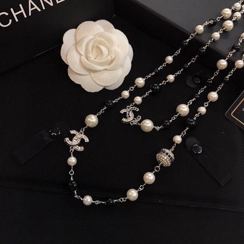18K  Chanel Long Black Pearl Necklace