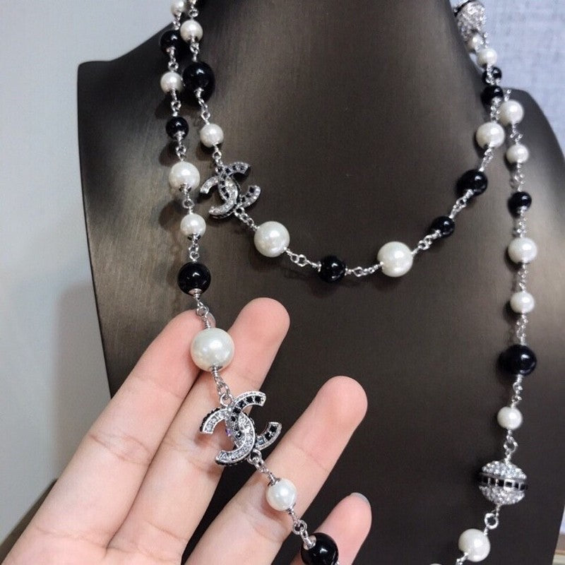 18K  Chanel Long Black Pearl Necklace