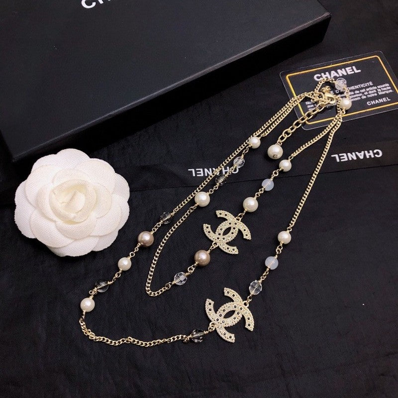 18K  Chanel Long Pearl Necklace