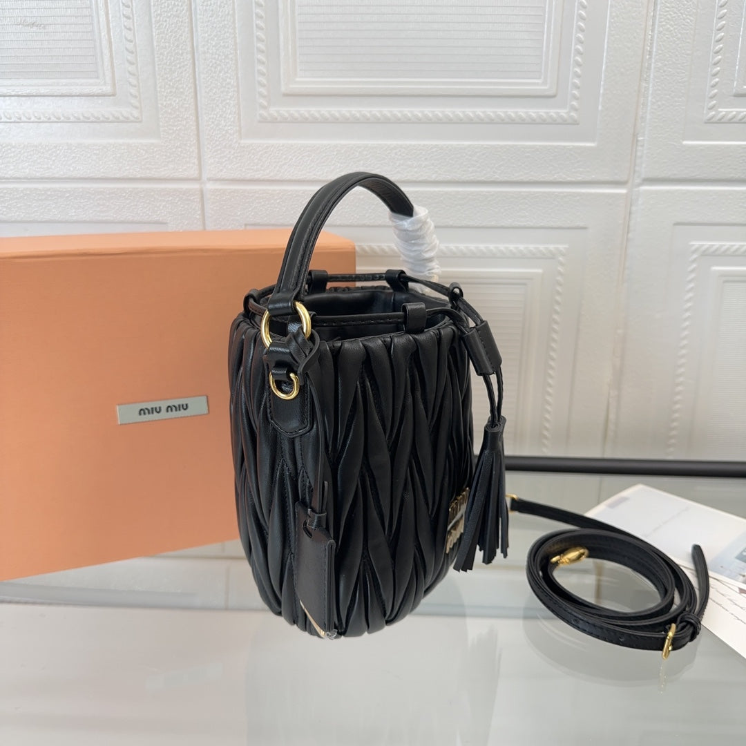 MATELASSÉ SMALL HANDBAG 17 IN BLACK LAMBSKIN