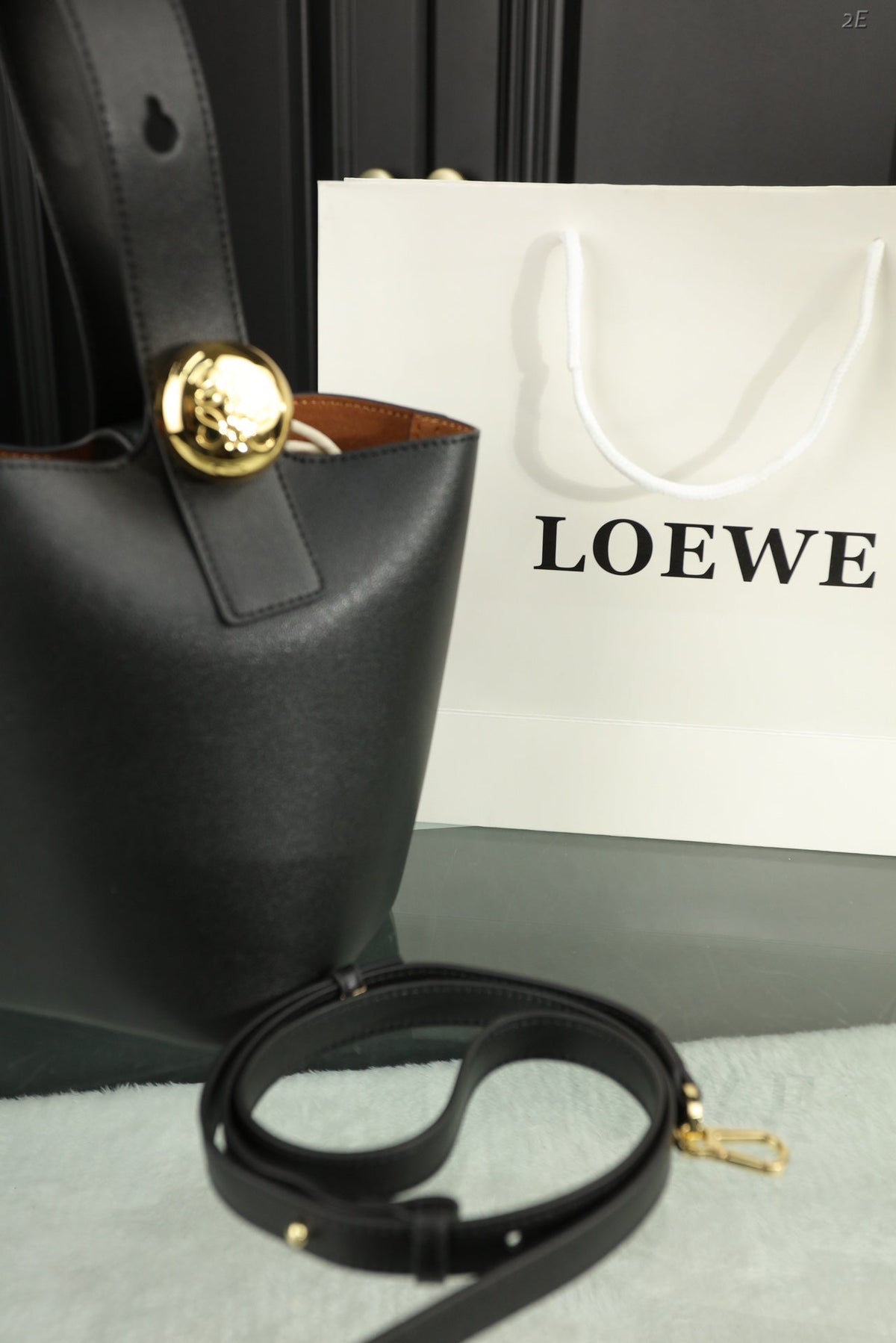 LOE MINI 19 PEBBLE BUCKET IN BLACK MELLOW CALFSKIN