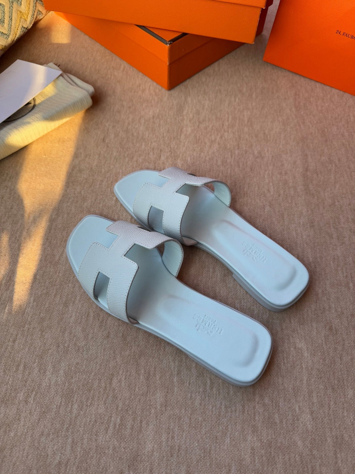 HERMES 0RAN SANDALS IN ICE BLUE CALFSKIN