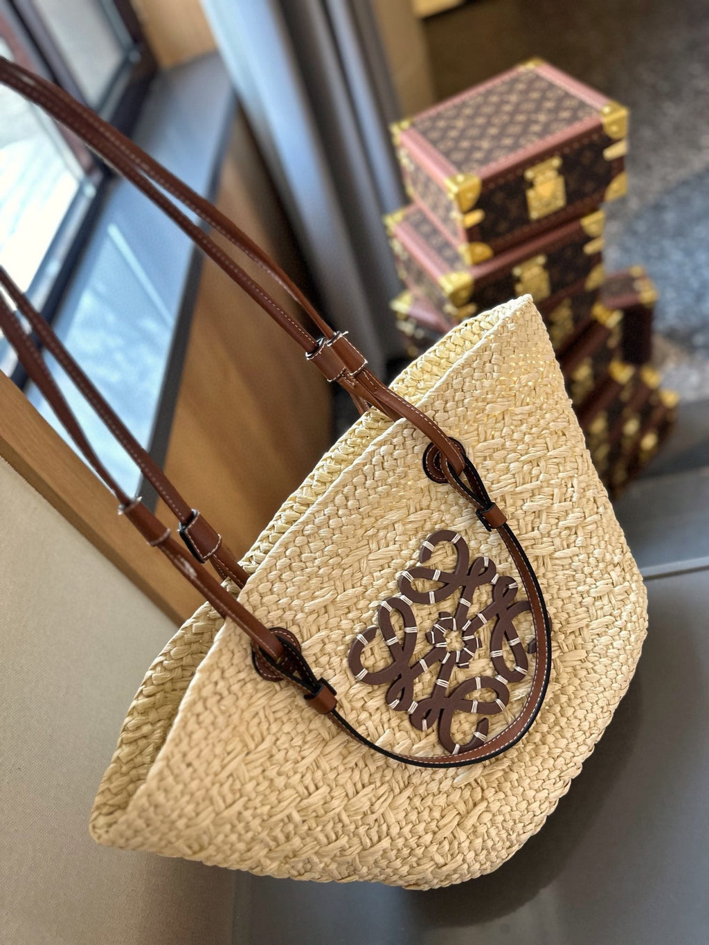 LOE SMALL ANAGRAM BASKET 28 BAG IN NATURAL MIX BROWN IRACA PALM AND CALFSKIN