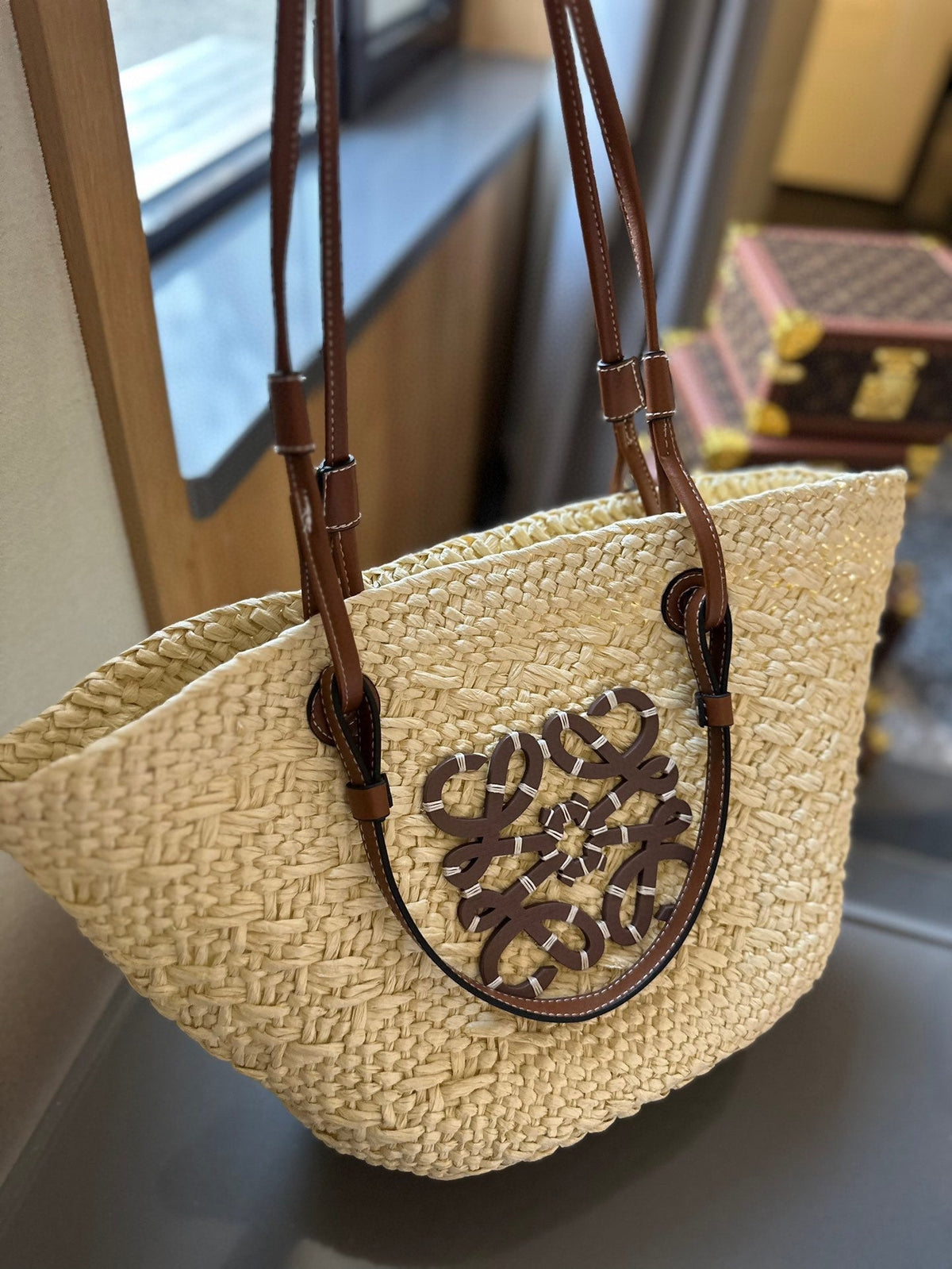 LOE SMALL ANAGRAM BASKET 28 BAG IN NATURAL MIX BROWN IRACA PALM AND CALFSKIN