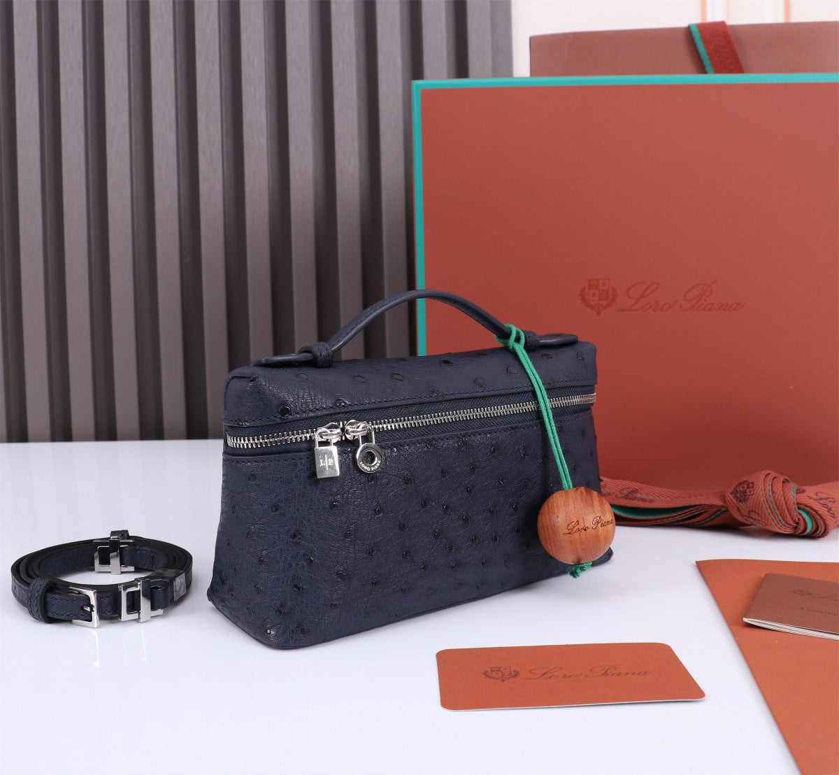 EXTRA POCKET L19 IN SPACE BLUE OSTRICH LEATHER