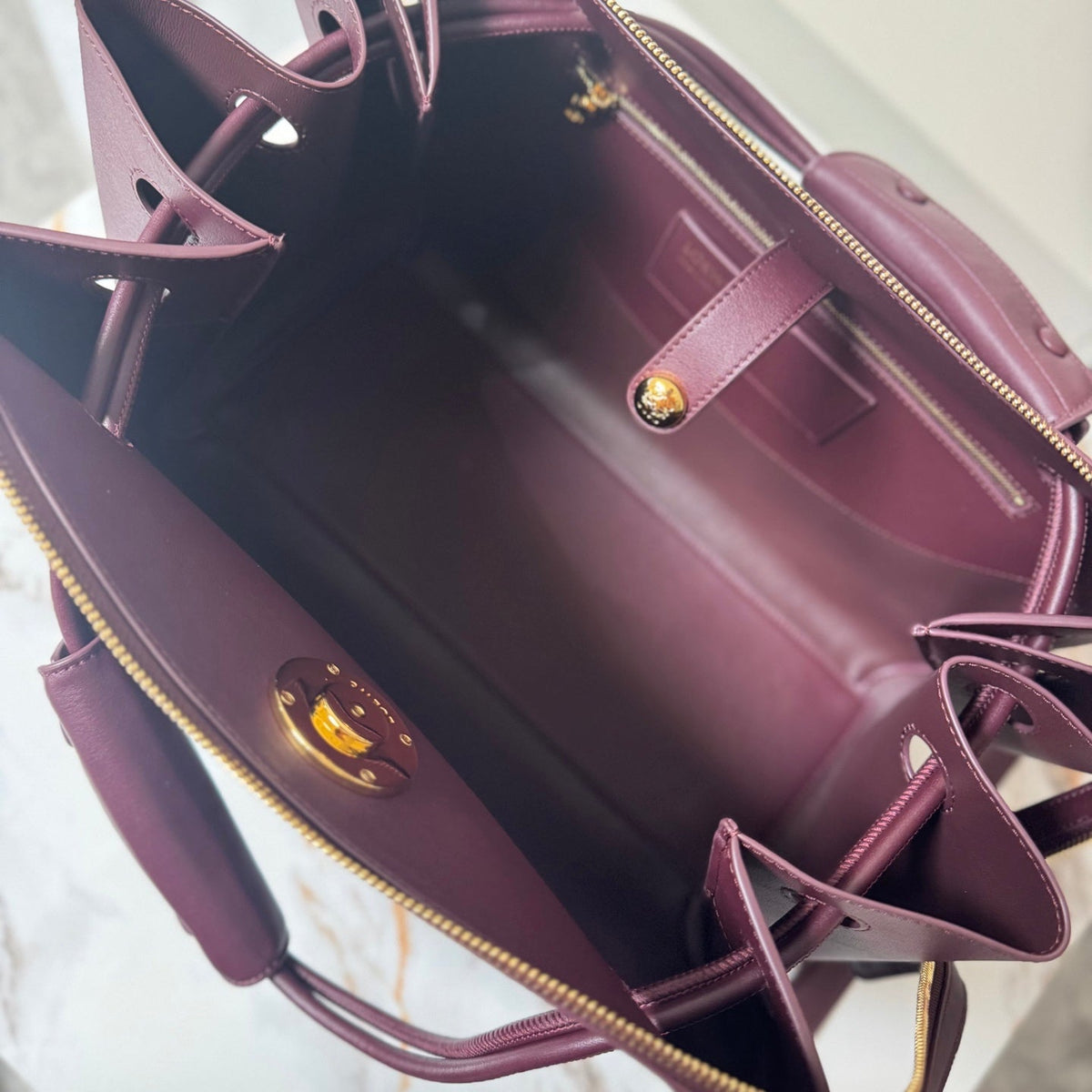 LOEWE 25S LARGE MADRID BAG 33 IN DARK WINE CALFSKIN GOLD HARDWARE