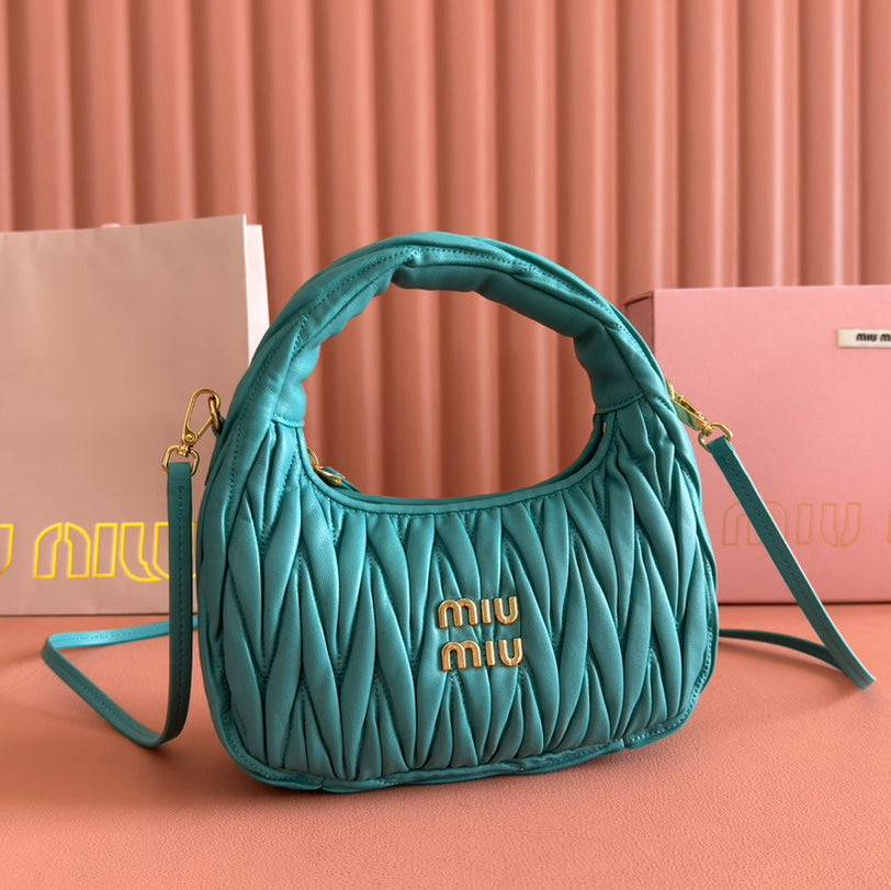 WANDER MATELASSÉ HANDBAG 23 IN LAGOON BLUE LAMBSKIN