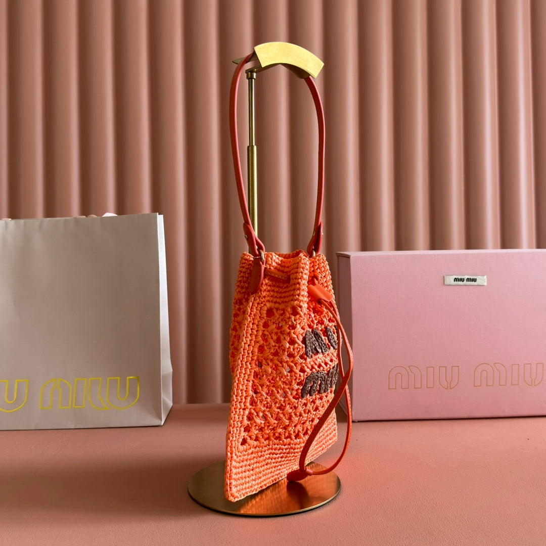 MIUMIU 26S WANDER BUCKET BAG 23 IN ORANGE RAFFIA WITH LEATHER TRIM