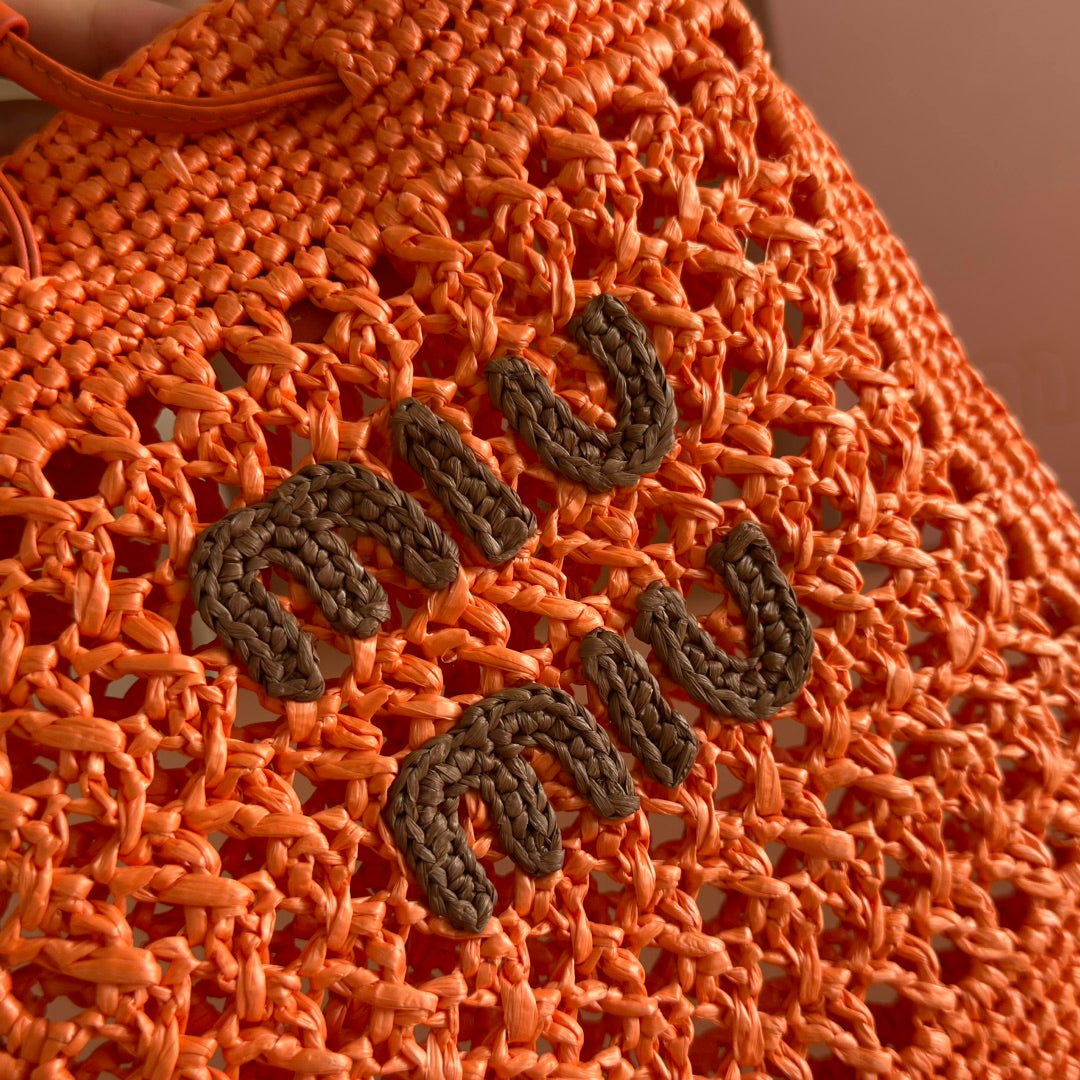 MIUMIU 26S WANDER BUCKET BAG 23 IN ORANGE RAFFIA WITH LEATHER TRIM
