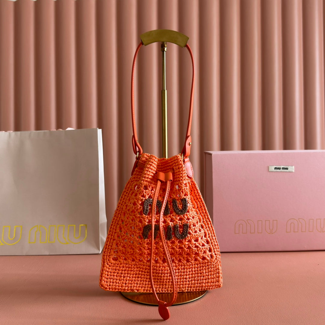 MIUMIU 26S WANDER BUCKET BAG 23 IN ORANGE RAFFIA WITH LEATHER TRIM