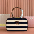 MIUMIU 25S BEAU BAG 34 DARK BLUE AND IVORY IN CANVAS AND CALFSKIN