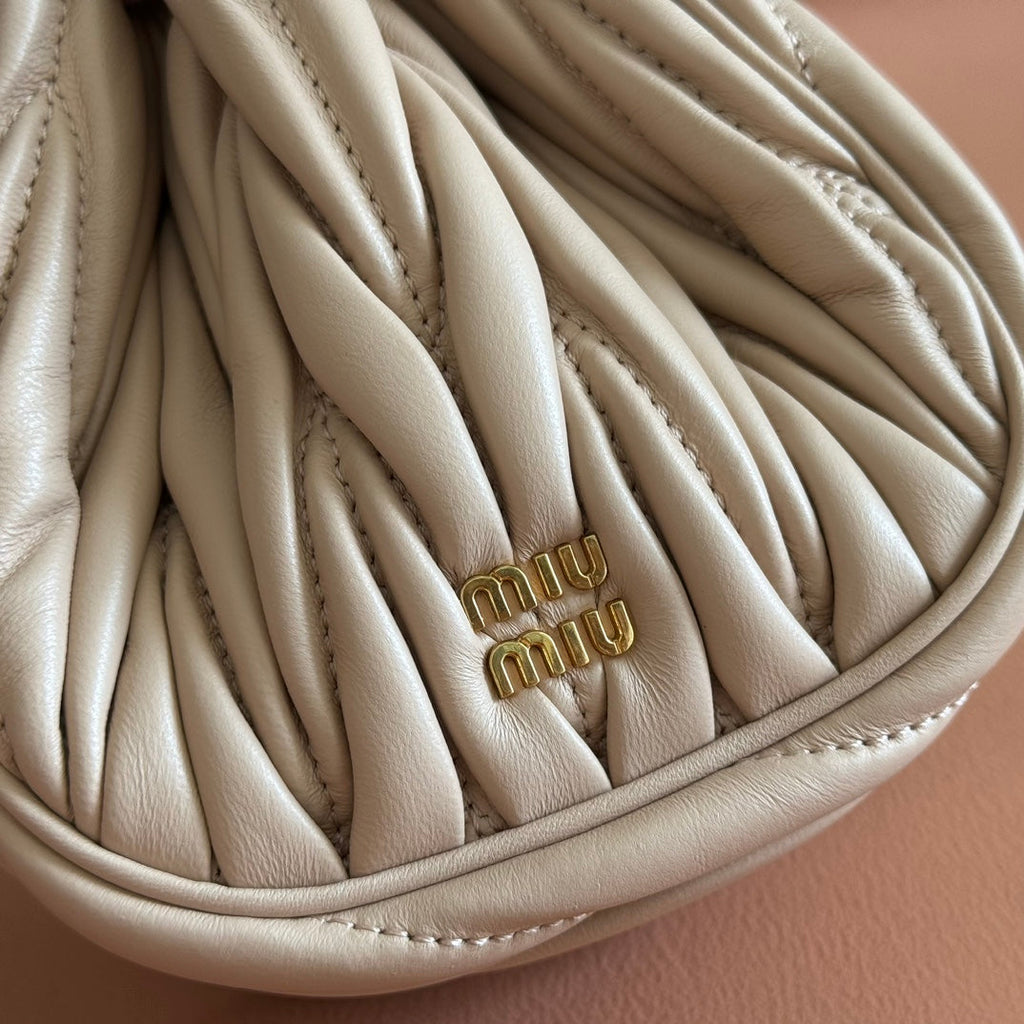 MIUMIU 26S MATELASSE POUCH BAG 16 IN LIGHT BEIGE CALFSKIN GOLD HARDWARE