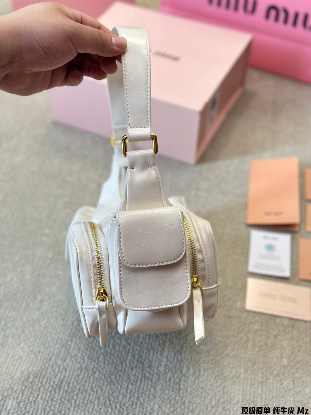 PUCKET BAG 27 IN WHITE CALFSKIN