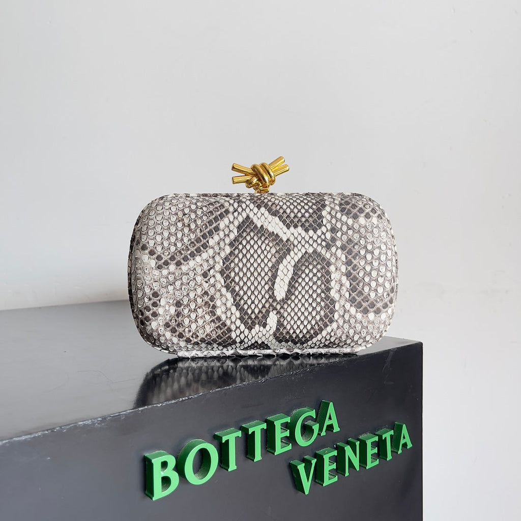 KNOT CHAIN CLUTCH 20.5 IN SNAKE PATTERN CALFSKIN