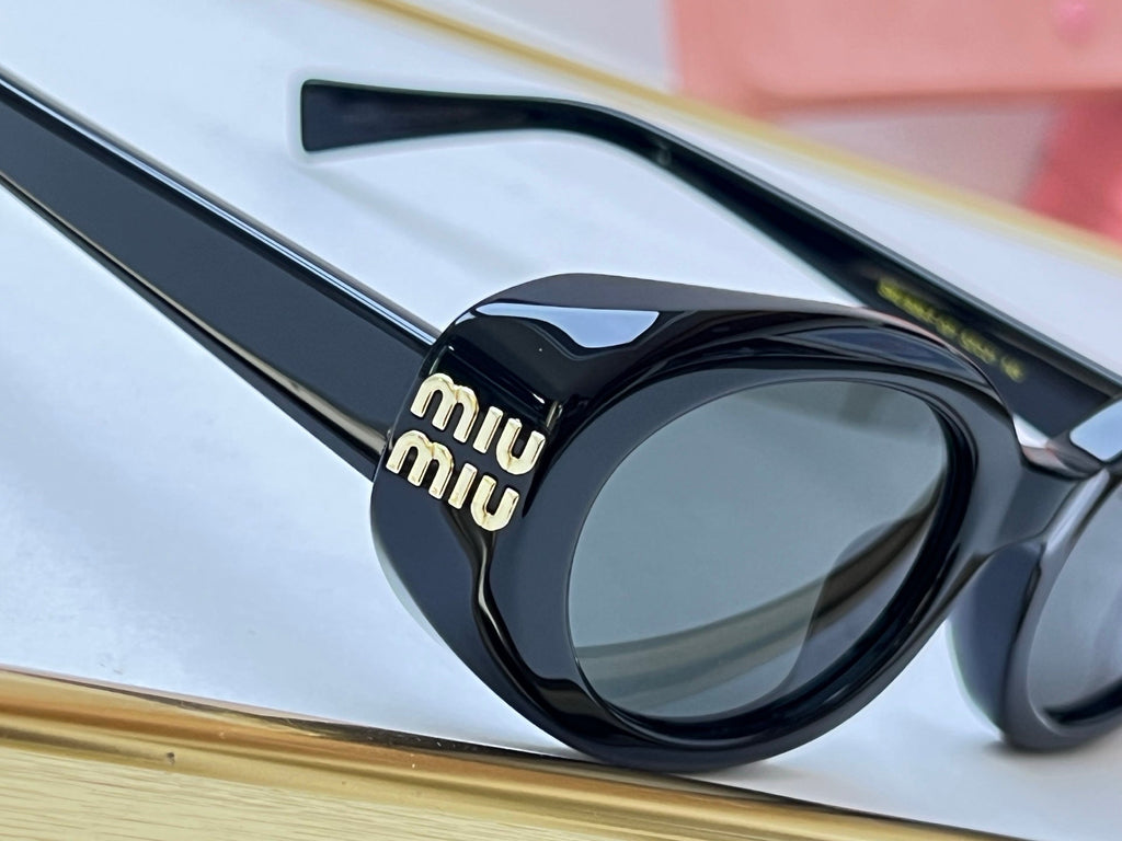 Miu Miu SMU B09-F Sunglasses